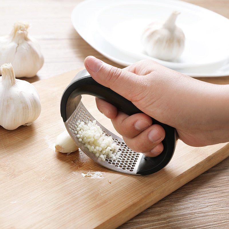 Garlic Presser™